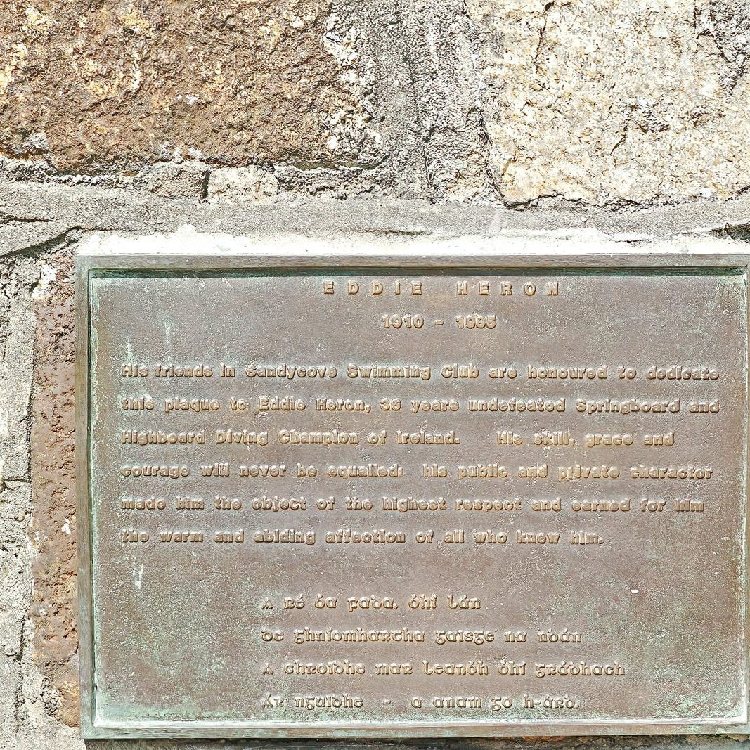 A PLAQUE IN HONOUR OF EDDIE HERON THE FAMOUS SPRINGBOARD DIVER