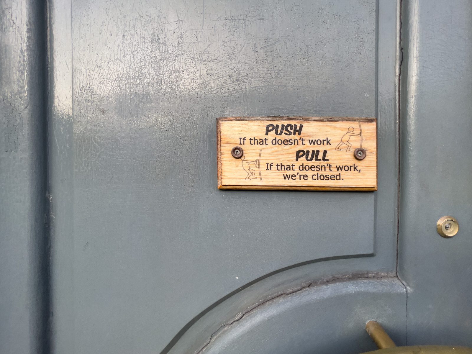 ARE YOU A PUSHER OR A PULLER [SIGN ON A DOOR IN DUBLIN]