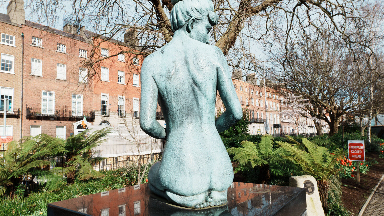 IN MERRION SQUARE THERE IS A WONDERFUL MEMORIAL TO OSCAR WILDE [IT IS BY DANNY OSBORNE AND THERE ARE THREE DISTINCT ELEMENTS]-229779-1