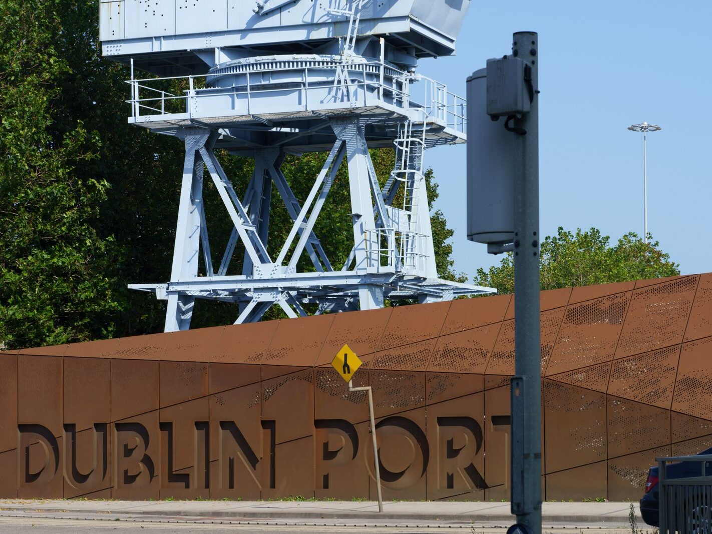 THE CORTEN STEEL SIGN LOOKS LIKE A SHIP PLUS REFURBISHED CRANE [DUBLIN PORT 2024]-239598-1