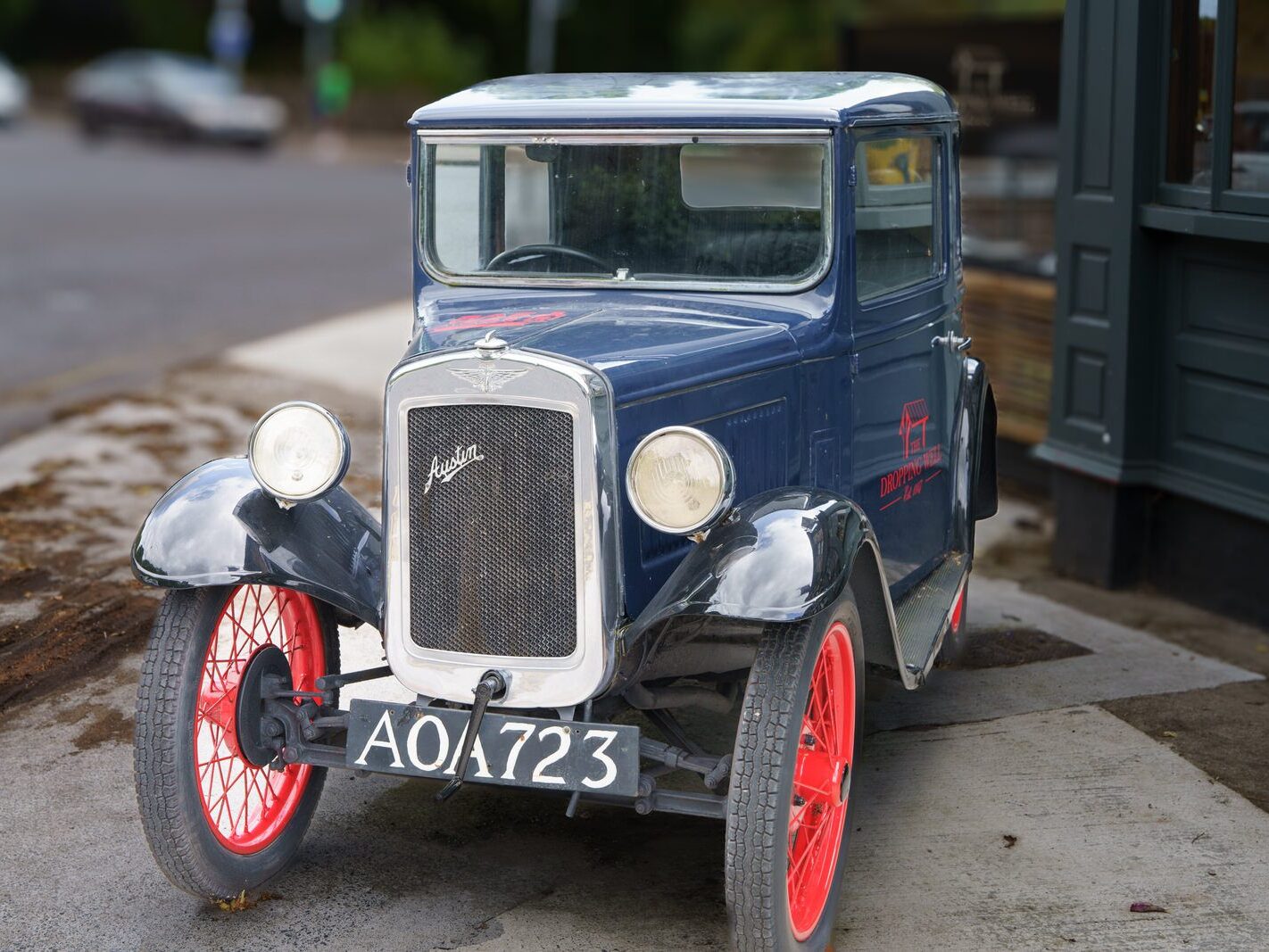 I WONDER IF MY CAR HAS ANY TRADE IN VALUE [OLD BABY AUSTIN CAR PARKED AT THE DROPPING WELL PUB]-239258-1