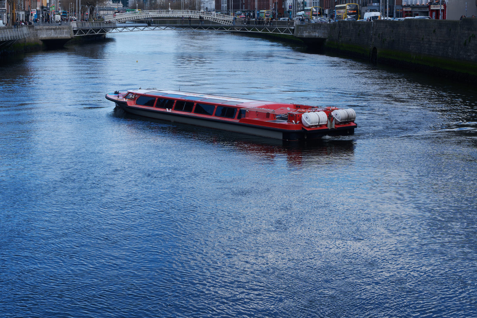 GLASS ROOFED TOUR BOAT ON THE RIVER LIFFEY