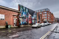 EXAMPLES OF STREET ART BY DANK AND SABEK [ON THE RED BRICK WALL ON TALBOT STREET IN BELFAST]-235442-1 MURAL ON TALBOT STREET