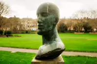 THE TRIBUTE HEAD BY DAME ELISABETH FRINK PHOTOGRAPHED CHRISTMAS DAY 2024 [A TRIBUTE TO NELSON MANDELA]-245746-1