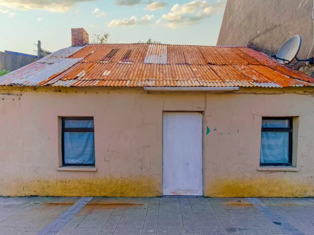 DERELICT WITH TIN ROOF