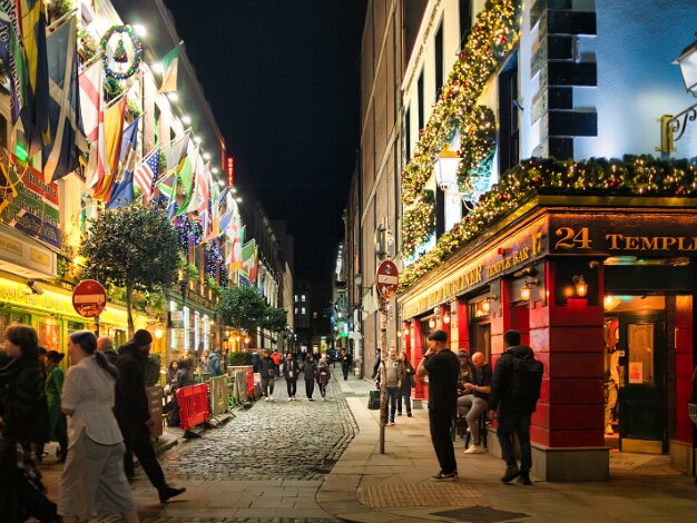 TEMPLE BAR THE PUB f you have ever stood on a cobbled street in Dublin, checking Google Maps and asking a passing local, "Excuse me, where...