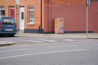 THE BOOK READER AN EXAMPLE OF PAINT-A-BOX STREET ART ON NORTH KING STREET [BY PAWEL JASINSKI]-238371-1 BY PAWEL JASINSKI