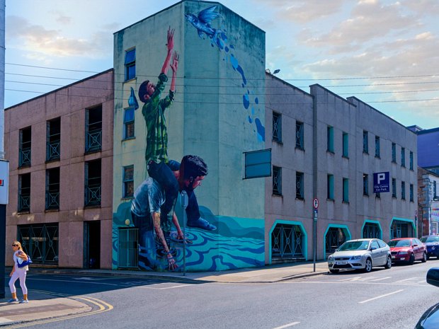 FISHERMEN MURAL Magee's murals have a dreamlike quality, drawing you in with their flowing lines and muted colours. In "The Fishermen,"...