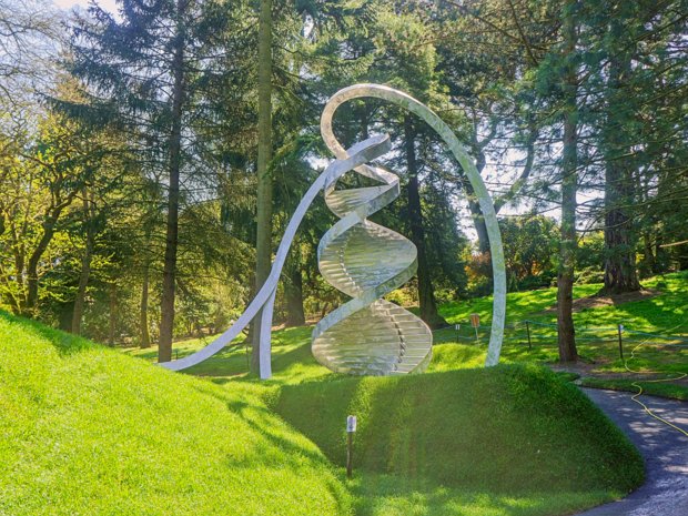 DNA SCULPTURE MAY 2013 The sculpture is a large, double-helix structure made of stainless steel. It stands over 20 feet tall and is located...