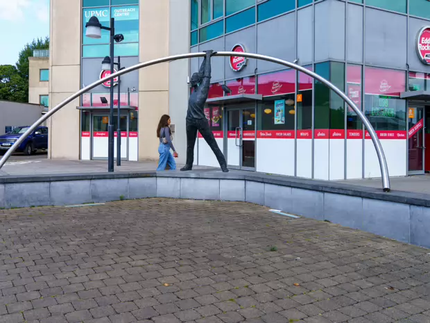 LEANING MAN