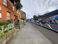 MURAL BY CLAIRE PROUVOST ON THE REDUNDANT MOVING WALKWAY [ENTRANCE TO THE ORIGINAL AND FIRST SHOPPING CENTRE IN DUNDRUM]-231553-1