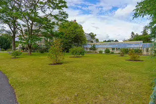 SOME OF THE GLASSHOUSES AT THE BOTANIC GARDENS SOME OF THE GLASSHOUSES AT THE BOTANIC GARDENS