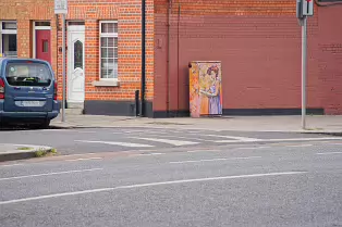 THE BOOK READER AN EXAMPLE OF PAINT-A-BOX STREET ART ON NORTH KING STREET [BY PAWEL JASINSKI]-238371-1 BY PAWEL JASINSKI