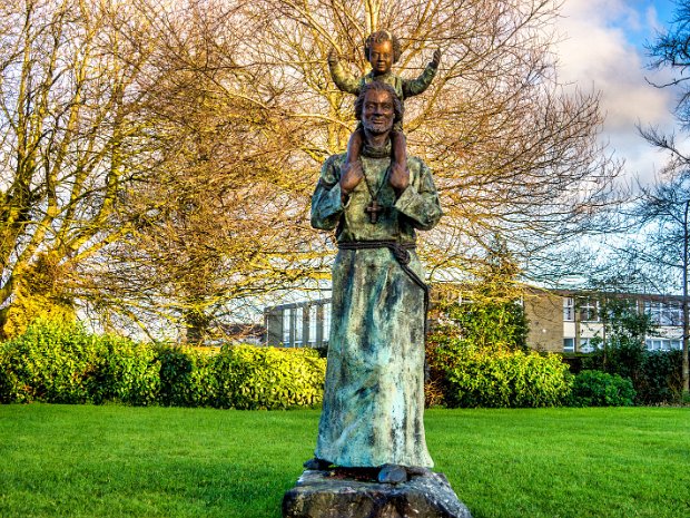 SAINT CONLETH'S STATUE In August 2024 when I photographed this sculpture and garden the statue portrayed the saint with a child perched upon...