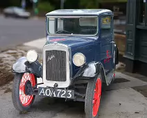 I WONDER IF MY CAR HAS ANY TRADE IN VALUE [OLD BABY AUSTIN CAR PARKED AT THE DROPPING WELL PUB]-239258-1