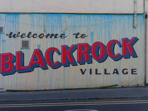 BLACKROCK VILLAGE Blackrock began as a small fishing village. Its name derives from the distinctive black limestone rock formations found...