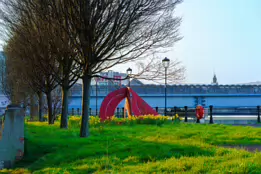 A RED METAL YOKE BY BOB SLOAN [THIS SCULPTURE IN BELFAST HAS NO NAME]-203538-1