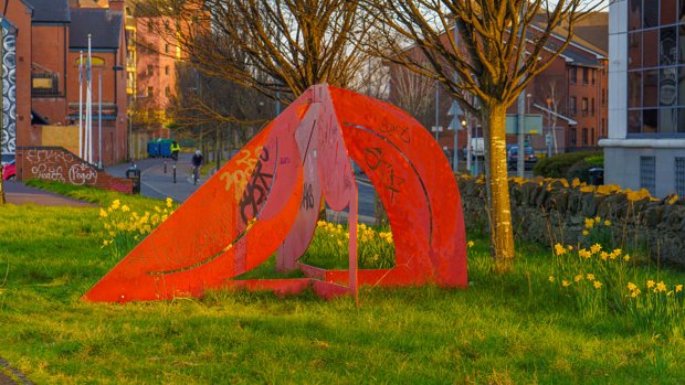 RED METAL SCULPTURE Based on these sources, it is safe to say that the sculpture is indeed called "Greenland 1983" and was created by Bob...