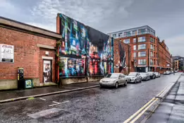 EXAMPLES OF STREET ART BY DANK AND SABEK [ON THE RED BRICK WALL ON TALBOT STREET IN BELFAST]-235442-1 MURAL ON TALBOT STREET