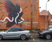 EXAMPLES OF STREET ART BY DANK AND SABEK [ON THE RED BRICK WALL ON TALBOT STREET IN BELFAST]-235444-1 MURAL ON TALBOT STREET