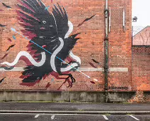 EXAMPLES OF STREET ART BY DANK AND SABEK [ON THE RED BRICK WALL ON TALBOT STREET IN BELFAST]-235445-1 MURAL ON TALBOT STREET