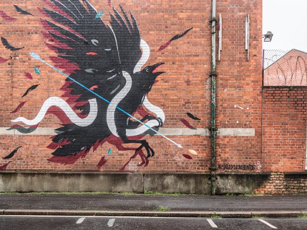 RED BRICK WALL These images, captured in May 2017 and remastered in July 2024, showcase the vibrant street art scene in Belfast. They...