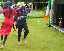 PERFORMING IN THE RAIN ON NEPAL IRELAND DAY [RAINDROPS ARE VISIBLE IN SOME PHOTOGRAPHS]-235605-1