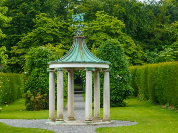 THE STONE TEMPLE It was created as a focal point in 1971 by Benjamin and Miranda Guinness.