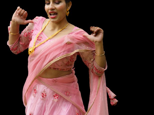 Lady In Pink Traditional Instruments: The sounds of the madal (a hand drum), bansuri (a bamboo flute), and sarangi (a bowed string...