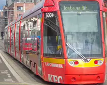 A VERY DISTINCTIVE RED TRAM PROMOTING KFC [AN EXAMPLE OF FULL BODY ADVERTISING REFERRED TO AS WRAPPING]-236696-1