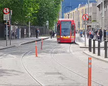 A VERY DISTINCTIVE RED TRAM PROMOTING KFC [AN EXAMPLE OF FULL BODY ADVERTISING REFERRED TO AS WRAPPING]-236689-1