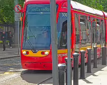 A VERY DISTINCTIVE RED TRAM PROMOTING KFC [AN EXAMPLE OF FULL BODY ADVERTISING REFERRED TO AS WRAPPING]-236690-1