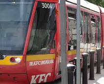 A VERY DISTINCTIVE RED TRAM PROMOTING KFC [AN EXAMPLE OF FULL BODY ADVERTISING REFERRED TO AS WRAPPING]-236691-1