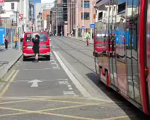 A VERY DISTINCTIVE RED TRAM PROMOTING KFC [AN EXAMPLE OF FULL BODY ADVERTISING REFERRED TO AS WRAPPING]-236693-1