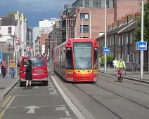 A VERY DISTINCTIVE RED TRAM PROMOTING KFC [AN EXAMPLE OF FULL BODY ADVERTISING REFERRED TO AS WRAPPING]-236697-1