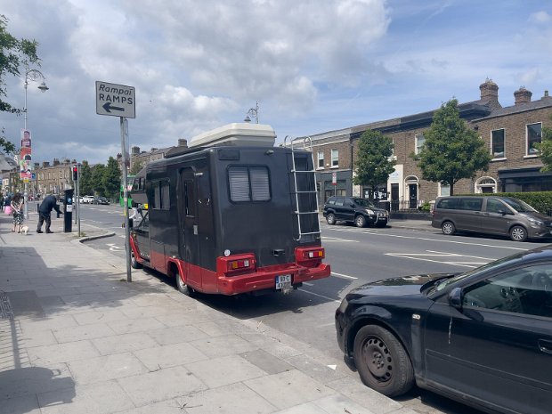 CAMPER VAN ON MANOR STREET In the US RVs are often enormous, prioritizing spacious living quarters, multiple rooms, and even slide-outs to expand...