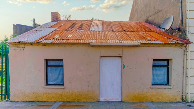 DERELICT WITH TIN ROOF