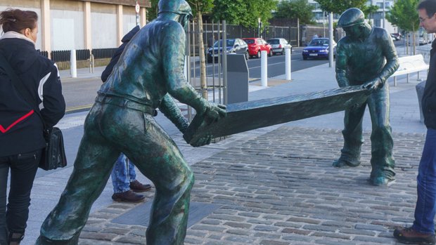 DOCKERS MONUMENT The Dockers’ Sculpture in Limerick, also known as the Dockers’ Monument, is a significant piece of public art that pays...