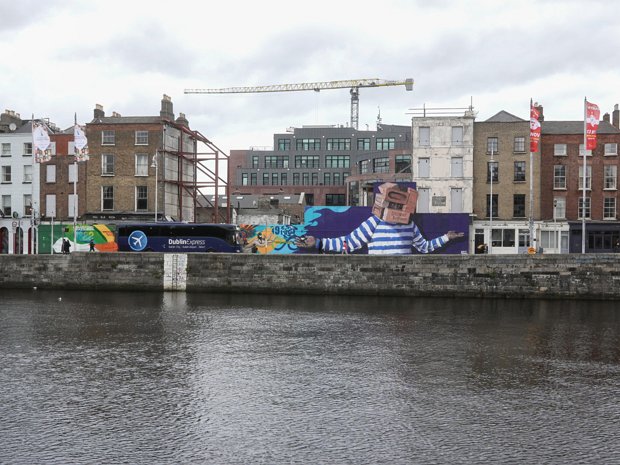 MURAL BY ASBESTOS AT THE ORMOND HOTEL This mural on Ormond Quay at the site of the former Ormond Hotel is a collaboration between the Brazilian artist Neto...