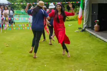 PERFORMING IN THE RAIN ON NEPAL IRELAND DAY [RAINDROPS ARE VISIBLE IN SOME PHOTOGRAPHS]-235604-1