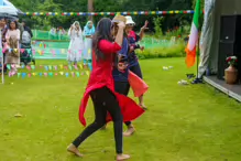 PERFORMING IN THE RAIN ON NEPAL IRELAND DAY [RAINDROPS ARE VISIBLE IN SOME PHOTOGRAPHS]-235602-1