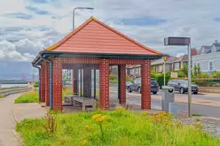 BUS SHELTER 1725 AT DOYLE'S LANE [A HAVEN IN THE RAIN FOR MYSELF AND TWO PASSING DOGS]-237264-1