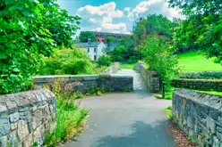 THE RIVER DODDER AND PACKHORSE BRIDGE [MILLTOWN ROAD IN CLONSKEAGH]-220375-1