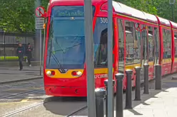 A VERY DISTINCTIVE RED TRAM PROMOTING KFC [AN EXAMPLE OF FULL BODY ADVERTISING REFERRED TO AS WRAPPING]-236690-1