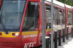 A VERY DISTINCTIVE RED TRAM PROMOTING KFC [AN EXAMPLE OF FULL BODY ADVERTISING REFERRED TO AS WRAPPING]-236691-1