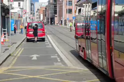 A VERY DISTINCTIVE RED TRAM PROMOTING KFC [AN EXAMPLE OF FULL BODY ADVERTISING REFERRED TO AS WRAPPING]-236693-1