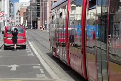 A VERY DISTINCTIVE RED TRAM PROMOTING KFC [AN EXAMPLE OF FULL BODY ADVERTISING REFERRED TO AS WRAPPING]-236694-1