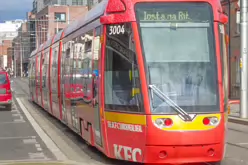 A VERY DISTINCTIVE RED TRAM PROMOTING KFC [AN EXAMPLE OF FULL BODY ADVERTISING REFERRED TO AS WRAPPING]-236696-1