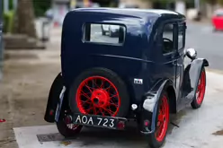 I WONDER IF MY CAR HAS ANY TRADE IN VALUE [OLD BABY AUSTIN CAR PARKED AT THE DROPPING WELL PUB]-239257-1