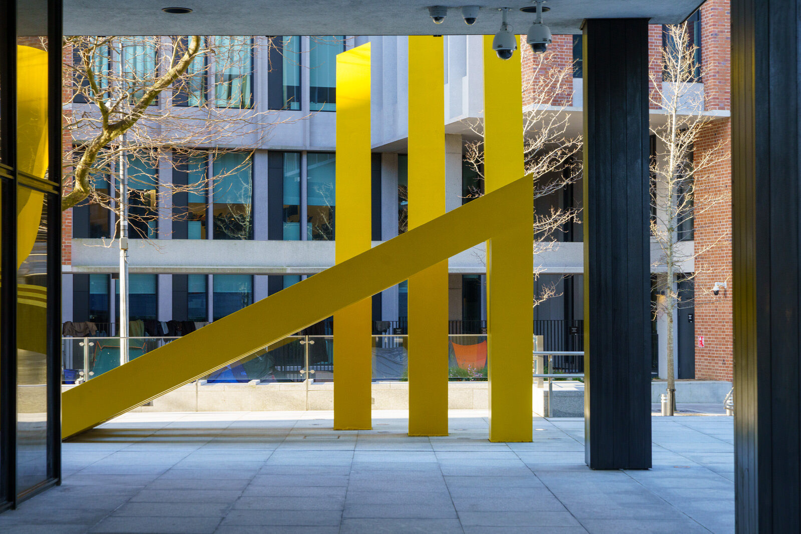 SCULPTURE BY MICHAEL BULFIN AT MIESIAN PLAZA [YELLOW STEEL GEOMETRIC REFLECTIONS]-227870-1